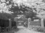 Archway to Picuris Pueblo, New Mexico -Cris Pulos